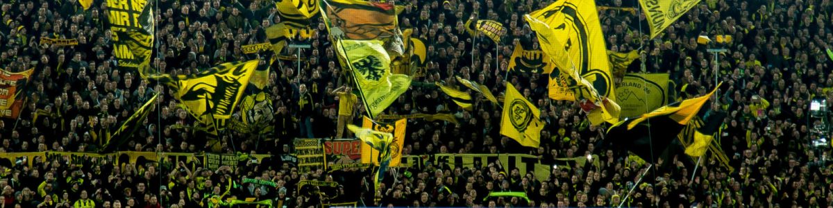 Dortmund, GERMANY - NOVEMBER 19: The yellow wall of supporters of Borussia Dortmund during the Bandesliga soccer match between BV Borussia Dortmund and FC Bayern Muenchen at the Signal Iduna Park in Dortmund, Germany on November 19, 2016. (Photo by TF-Images/Getty Images)